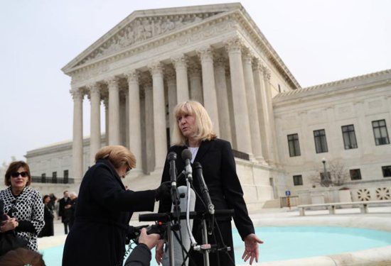 Sheri Lynn Johnson of the Cornell University Death Penalty Project, who represents death-row inmate Curtis Flowers, speaks to the news media outside the U.S. Supreme Court in Washington March 20, 2019. In mid-March, the Supreme Court considered possible racially biased juries in two death penalty cases, which included Flowers.