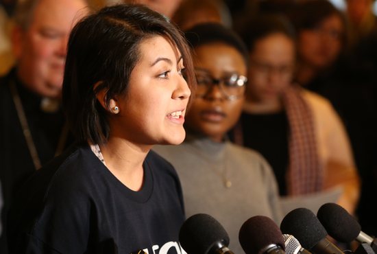 Veronica Orellana of Worthington, Minnesota, addresses a Feb. 21 news conference at the State Capitol in St. Paul about ways a legislative proposal to allow undocumented immigrants to apply for driver’s licenses would help her family.