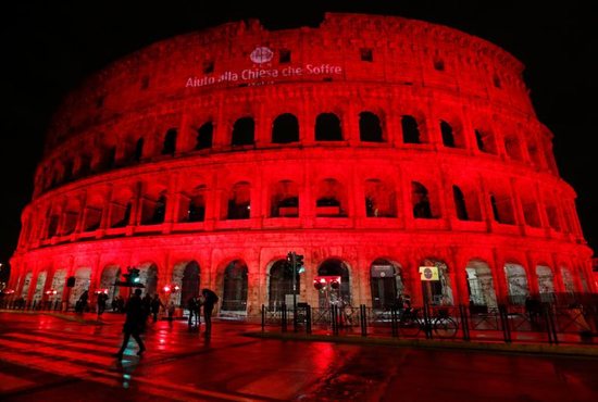 The Colosseum in Rome is lit in red to draw attention to the persecution of Christians around the world.