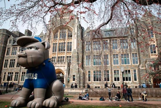 Students are seen on the campus of Georgetown University in Washington March 20, 2019.
