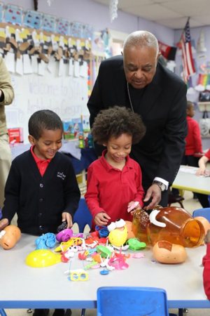 Archbishop Wilton D. Gregory greets students at St. Anthony Catholic School in Washington during a visit April 5, 2019, the day after Pope Francis named him as the new archbishop of Washington.