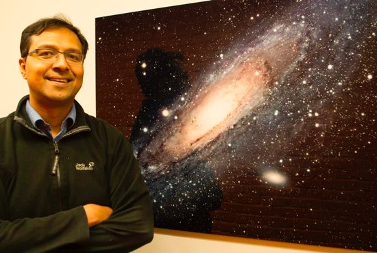 Jesuit Father Richard D'Souza, pictured in a May 8, 2019, photo, in Ann Arbor, Mich., studies the structure of stellar halos around galaxies. An astronomer on the Vatican Observatory staff, Father D'Souza is completing three years of post-doctoral research at the University of Michigan. 