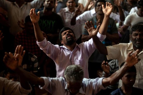 Members of Zion Church, which was bombed on Easter Sunday, pray at a community hall in Batticaloa, Sri Lanka, May 5, 2019. In the wake of deadly Easter terrorist attacks on Sri Lanka churches and other sites, Pope Francis condemned the brutal killings and called on all Sri Lankans to strengthen efforts to foster peace and justice.