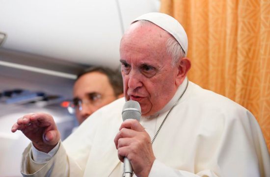 Pope Francis answers questions from journalists aboard his flight from Skopje, North Macedonia, to Rome May 7, 2019