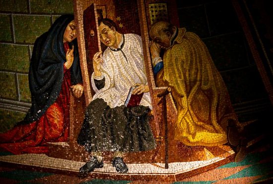 A mosaic image of St. John Nepomucene hearing confessions is displayed inside St. John Nepomucene Catholic Church in New York City May 2, 2019. The 14th-century Bohemian saint is considered the first martyr of the seal of confession. 