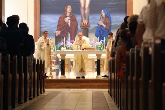 Bishop Barry C. Knestout of Richmond, Va., celebrates Mass June 2, 2019, at St. John the Apostle Church in Virginia Beach. Two days earlier 12 people were killed by a gunman at the city's Municipal Center. Among the victims was Mary Lou Gayle, a member of St. John the Apostle Church.