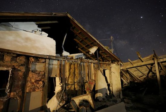 A house destroyed by a powerful 7.1 magnitude earthquake