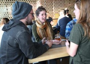 Catholic young adults gather at Able Seedhouse and Brewery in Northeast for a Catholic Beer Club