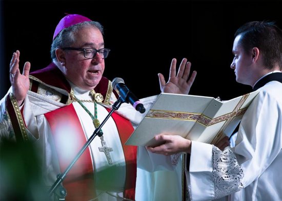 Bishop Michael Olson of Fort Worth, Texas, leads the morning prayer