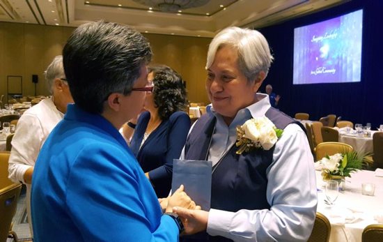 Sister Norma Pimentel, a member of the Missionaries of Jesus, greets Sister Teresa Maya, a member of the Sisters of Charity of the Incarnate Word