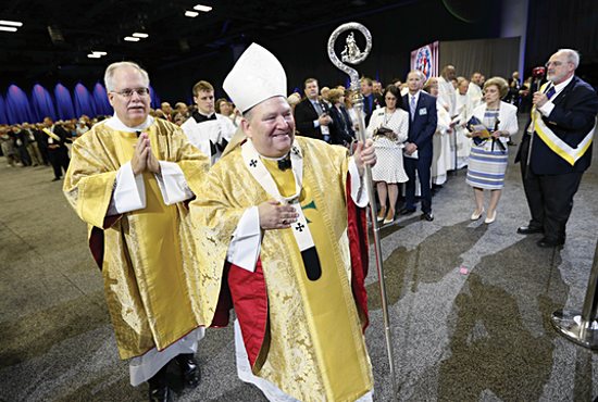 Archbishop Bernard Hebda prepares to preside at the opening Mass of the 137th annual Knights of Columbus Supreme Convention