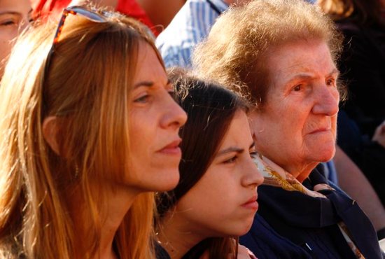 Family members from different generations attend an encounter and Mass for the elderly led by Pope Francis