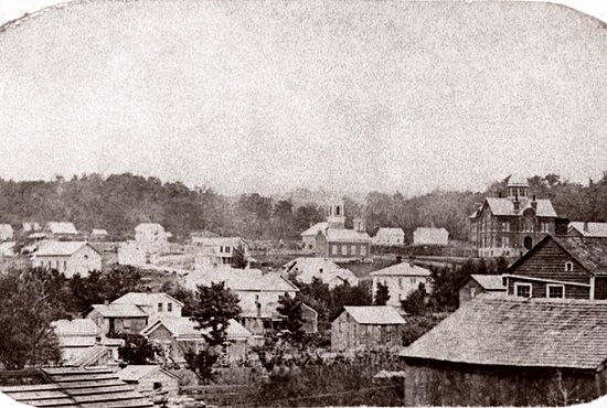 St. Joseph in Red Wing’s first church (left side, center), was a white, wood-framed structure dedicated in 1865. It seated 100 people and served as the parish home until a larger, stone church was built in 1877. 