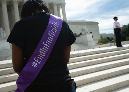 A pro-life advocate is seen near the steps of the U.S. Supreme Court in Washington Oct. 4, 2021, the first day of the high court's new term. 