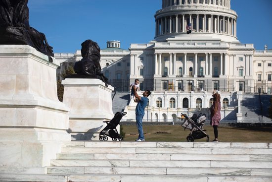 A family is seen near the U.S. Capitol in Washington Nov. 18, 2021. The Biden administration and the Department of Health and Human Services announced Nov. 18 the reversal of a Trump-era HHS rules change that ensured faith-based adoption and foster care agencies would not be excluded from federal funding for providing services consistent with their religious beliefs. 