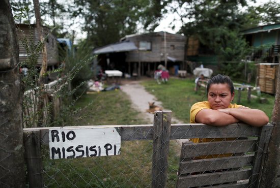 Jaqueline Romero, 23, stands outside her home in a poor section of Buenos Aires, Argentina, April 8, 2021, during the COVID-19 pandemic. Poverty and the aftermath of the pandemic are expected to be prominent at the Sixth Ecclesial Assembly of Latin America and the Caribbean in Mexico Nov. 21-28.