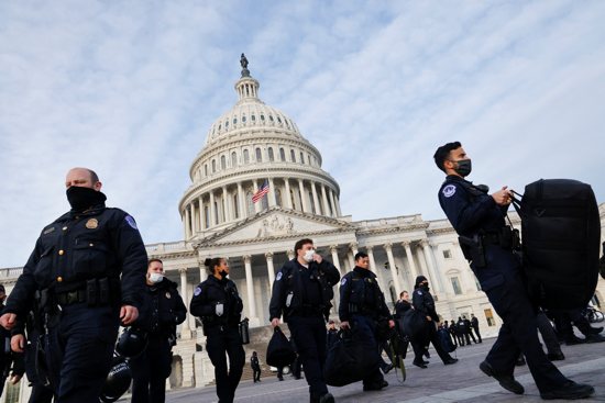 U.S. Capitol Police officers are seen on Capitol Hill in Washington Jan. 6, 2022, the first anniversary of the attack on the U.S. Capitol by supporters of former President Donald Trump. 