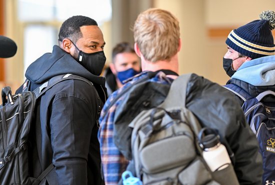 Jerome Bettis, an NFL Hall of Famer who played college football at the University of Notre Dame in Indiana, walks to an undergraduate class at the university's Mendoza College of Business Jan. 26, 2022. Before he was drafted to play in the NFL, he played three years at Notre Dame in the early 1990s and he recently returned to finish his undergraduate degree. 