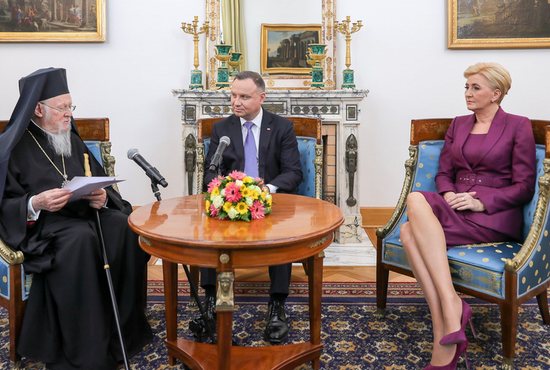 Ecumenical Patriarch Bartholomew of Constantinople meets with Polish President Andrzej Duda, and first lady Agata Kornhauser-Duda in Warsaw March 28, 2022. On a state visit to Poland March 27-28, 2022, the patriarch pledged solidarity with Ukrainians and praised the "generosity, mercy and hospitality" of Poles for taking in 2.3 million war refugees in one month.