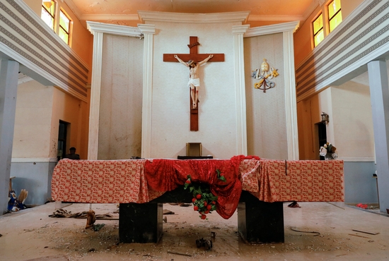 The altar is seen at St. Francis Xavier Church the day after worshippers were attacked by gunmen during the Pentecost Mass, in Owo, Nigeria, June 5, 2022. Reports said at least 50 people were killed in the attack. 