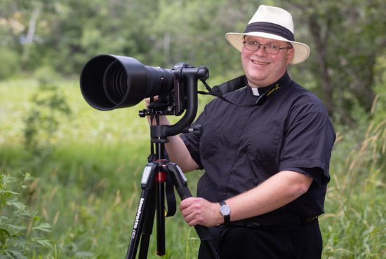 Father Paul Kammen uses this camera and tripod setup for taking photos of birds such as owls, warblers and eagles. Birds are his favorite type of wildlife to photograph.