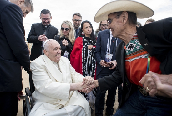 Pope Francis and Chief Wilton Littlechild say farewell to each other July 29, 2022, in Iqaluit, Nunavut, as the pope prepares to return to the Vatican after a six-day visit. Littlechild, a 78-year-old lawyer, survivor of abuse in a residential school and former grand chief of the Confederacy of Treaty Six First Nations, had lobbied hard for the pope to visit Canada and apologize to residential school survivors.