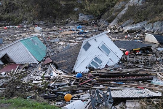 Destroyed homes are pictured along the coastline in Port Aux Basques, Newfoundland, Sept. 25, 2022. Canadian troops are being sent to assist the recovery from the devastation from Fiona, which hit the country's Atlantic provinces as a post-tropical storm and swept away houses, stripped off roofs and knocked out power. 