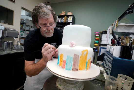 Baker Jack Phillips decorates a cake in his Masterpiece Cakeshop in Lakewood, Colo., Sept. 21, 2017.