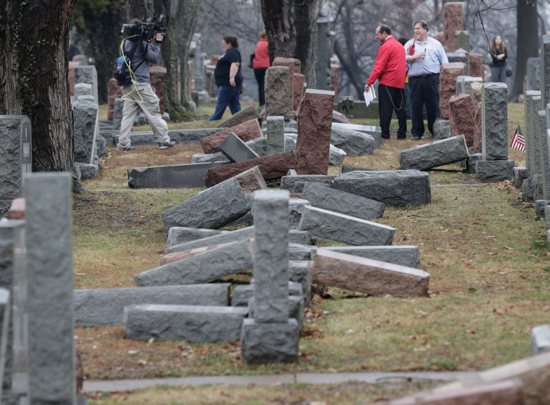 Local and national media in University City, Mo., report on more than 170 toppled Jewish headstones Feb. 21, 2017, after a weekend vandalism attack on Chesed Shel Emeth Cemetery near St. Louis.